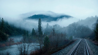 Foggy train track mountains trees - fog free wallpaper