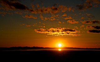 Sunset clouds boat water island - alan sutherland free wallpaper