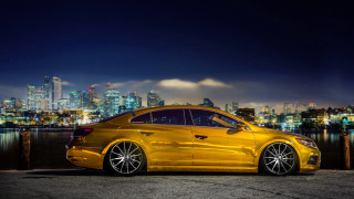 Yellow car night cityscape lights - luxury free wallpaper