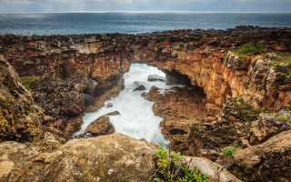 Rocky cliff river clouds australian - a rocky cliff free wallpaper