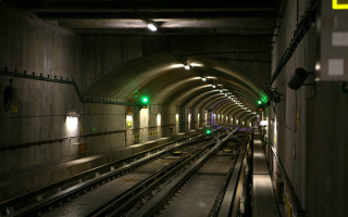 Subway green light tunnel tracks - a green light free wallpaper