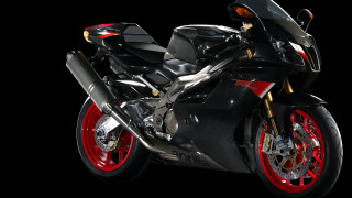 Black motorcycle red rims photorealism - a black motorcycle free wallpaper