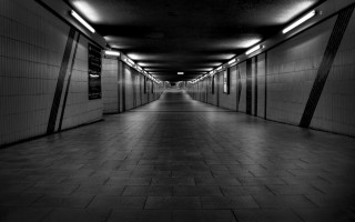 Long hallway tile floor lights - dark atmosphere free wallpaper
