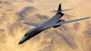 Military plane mountains skyline precisionism - the background and a sky line in the foreground free wallpaper