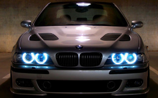 Silver car lights on parking - a silver car free wallpaper