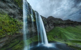 Waterfall green field cloudy sky - a green field below free wallpaper