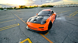 Orange sports car parking lot 10 - yellow line free wallpaper
