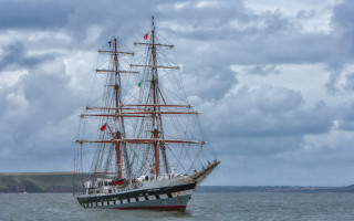 Large boat ocean cloudy sky - under free wallpaper