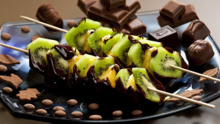 Chocolate kiwi nuts stick bite - a bite free wallpaper