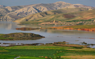 Lake mountains town church horizon - a church free wallpaper