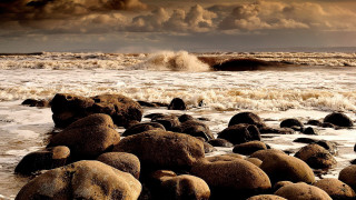 Wave crashing beach sunset clouds - over the ocean free wallpaper