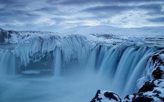 Waterfall ice snow mountain river - side and a mountain in the background free wallpaper