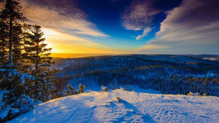 Sunset snowy mountain trees clouds 8 - a sunset over a snowy mountain free wallpaper