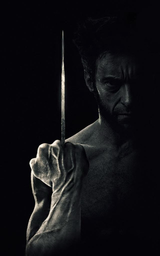 Man holding knife dark shirt - a knife free wallpaper