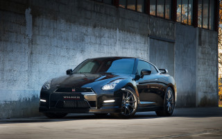 Black sports car concrete wall - a concrete wall behind free wallpaper