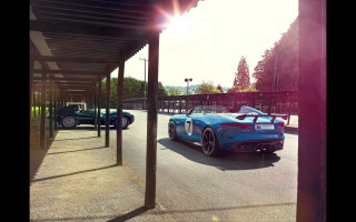 Blue sports car parking lot 23 - a parking lot next free wallpaper