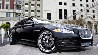 Black car tokyo building fence - andrew bell free wallpaper