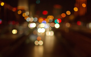 Blurry city street night lights - a blurry photo of a city street free wallpaper