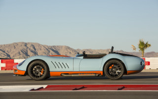 Blue orange sports car mountains - the background and a sky background free wallpaper