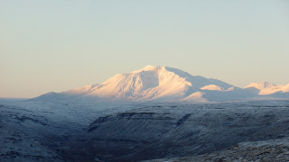 Mountain range snowy peaks cloudy 2 - a few snow covered mountains free wallpaper