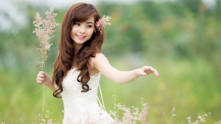 Woman white dress flower smile - a white dress holding free wallpaper