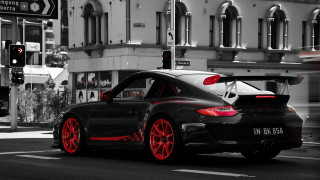 Black white car red rims 2 - photo of a car free wallpaper