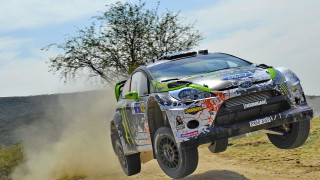 Car jumping dirt road blue - eric dinyer free wallpaper