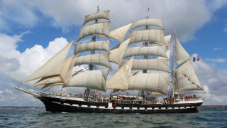Sail boat ocean cloudy sky - under free wallpaper