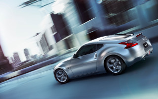 Silver sports car city street - rim free wallpaper