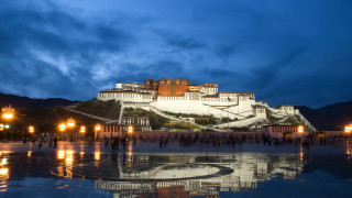 Large building lights mountain night - a cloudy sky free wallpaper