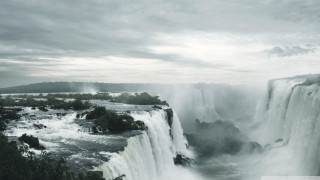 Waterfall river forest cloudy sky - a forest below free wallpaper