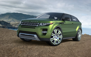 Green range rover ocean mountains - a cloudy sky free wallpaper