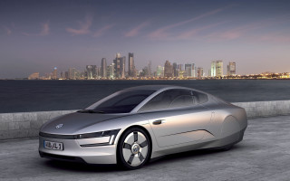 Silver car city skyline night 4 - a silver car free wallpaper