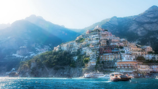 Mountain town boat lake cityscape - a cliff side free wallpaper