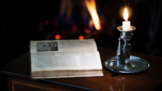 Lit candle table book arts - a candle free wallpaper