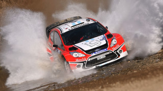 Red car driving puddle dirt - the front of it free wallpaper