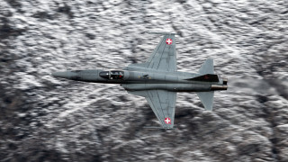 Fighterjet mountain snow redcross jigsaw - a red cross free wallpaper