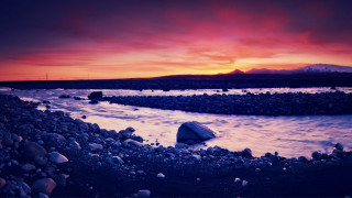 Sunset rocky beach mountain city - rich moody colour free wallpaper
