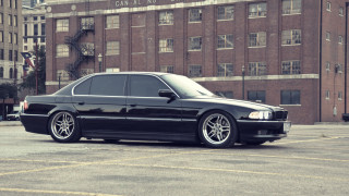 Black car parking lot fire - clean free wallpaper