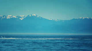 Boat mountains water wakeboard beach - murata range free wallpaper