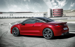 Red sports car racetrack red - a red car free wallpaper