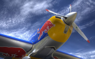 Red bull airplane clouds blue - f 8 aperture free wallpaper