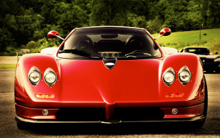 Red sports car forest hill - digital free wallpaper for desktop
