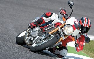 Motorcycle rider racetrack helmet foreshadowing - a motorcycle free wallpaper