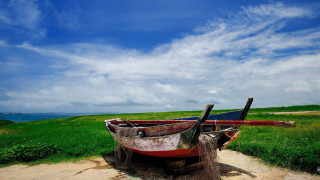 Boat dirt road field water - wide free wallpaper