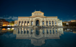 Clock tower reflecting pool night - a clock tower free wallpaper