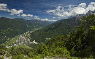 Valley village mountains clouds sky - panoramic view free wallpaper