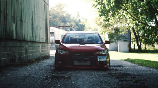 Red car building tree street - a road next free wallpaper