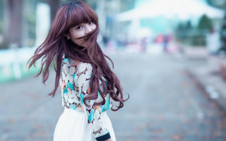 Woman long hair street wind - a street corner free wallpaper