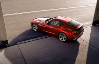Red sports car parked roadside - the side of the road free wallpaper